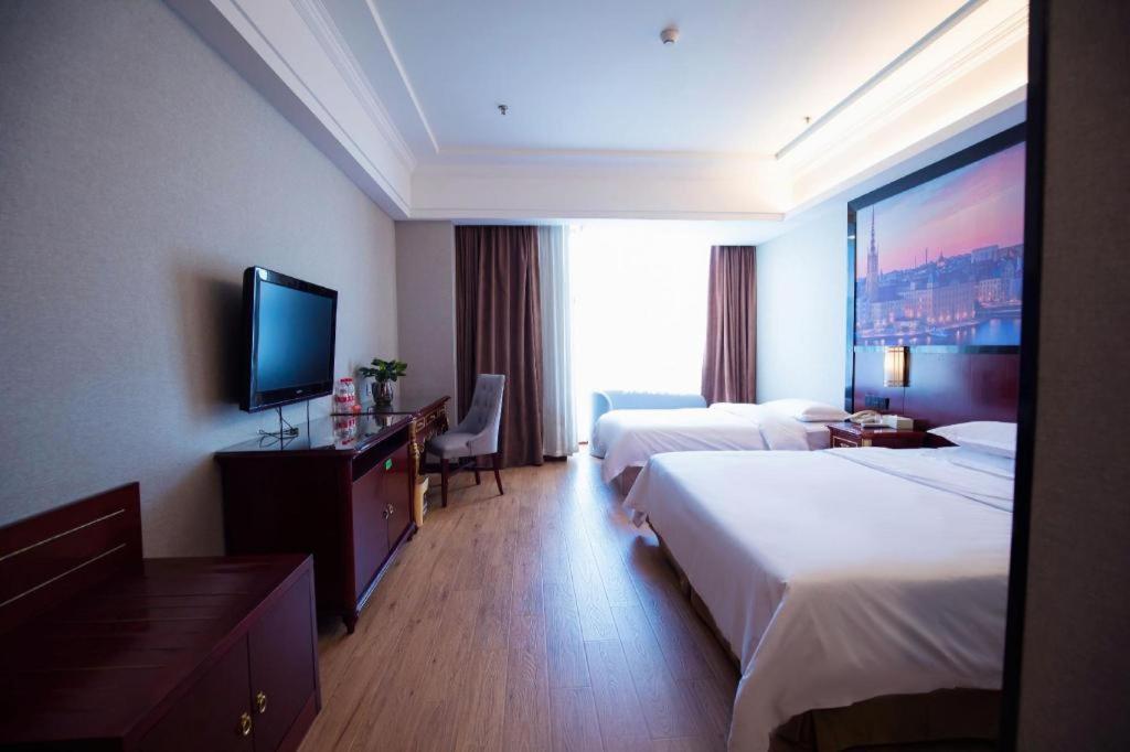 Hotel Vienna International Hongqiao Expo Center Caohejing 4*